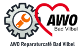 Orangener Schraubenschlüssel in einem Zahnrad zusammen mit dem AWO Herz und dem Text AWO Reparaturcafé Bad Vilbel